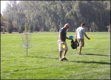 People playing on frisbee course